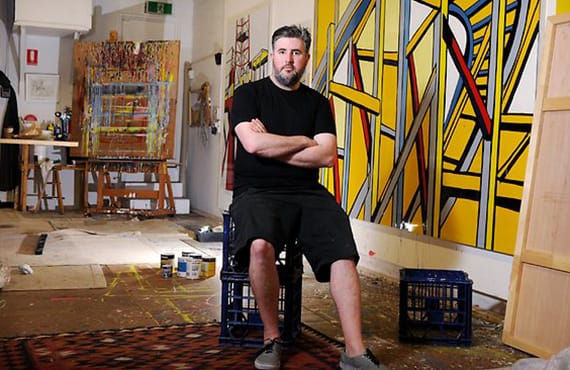 Jasper Knight painting with strong lines and geometric forms